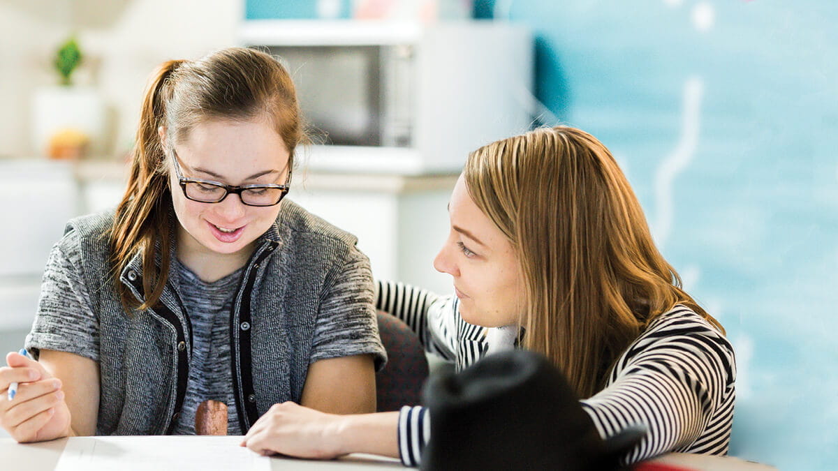 Person helping client understand a document