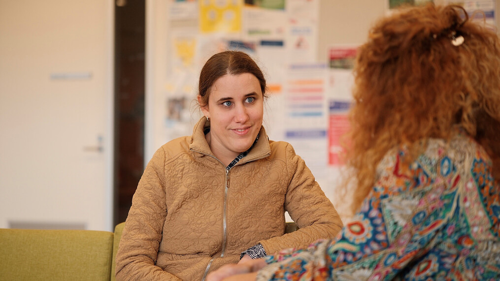 two-people-seated-in-meeting-space.jpg