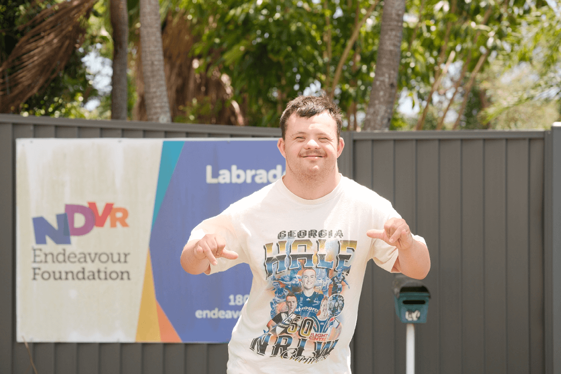 man-smiling-while-striking-a-pose