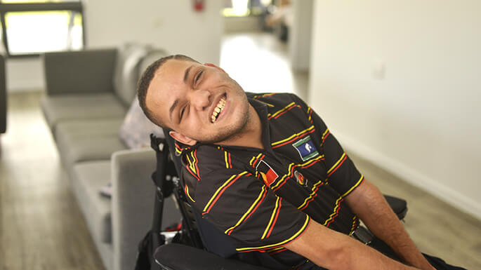 2_male-smiling-in-sda-homejpeg