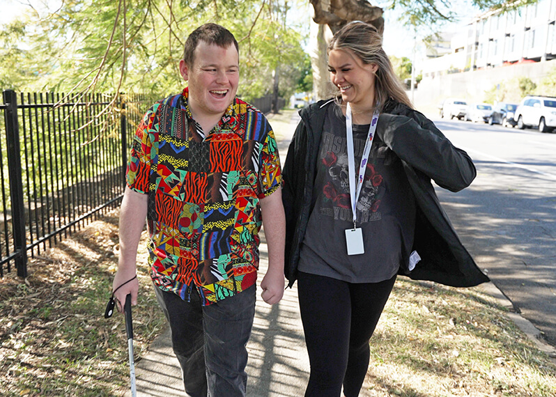 disability-support-worker-walking-with-participant.jpg