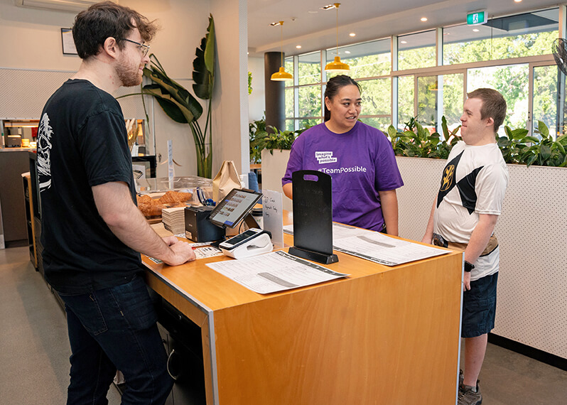 participant-and-support-worker-at-cafe-counter.jpg
