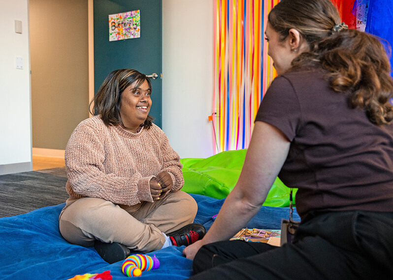 participant-and-support-worker-in-sensory-room.jpg