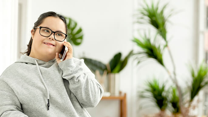 Woman-holding-mobile-phonejpeg