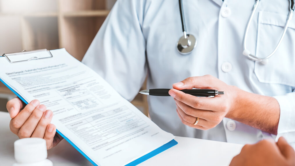 health-professional-reviewing-paperwork-with-patient.jpg