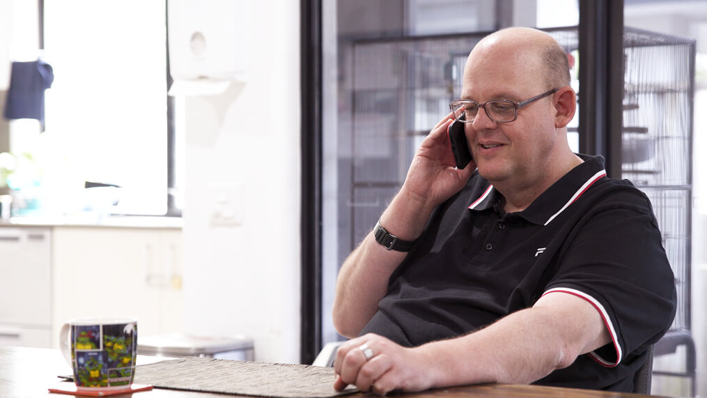 participant-talking-on-mobile-phone-at-home.jpg