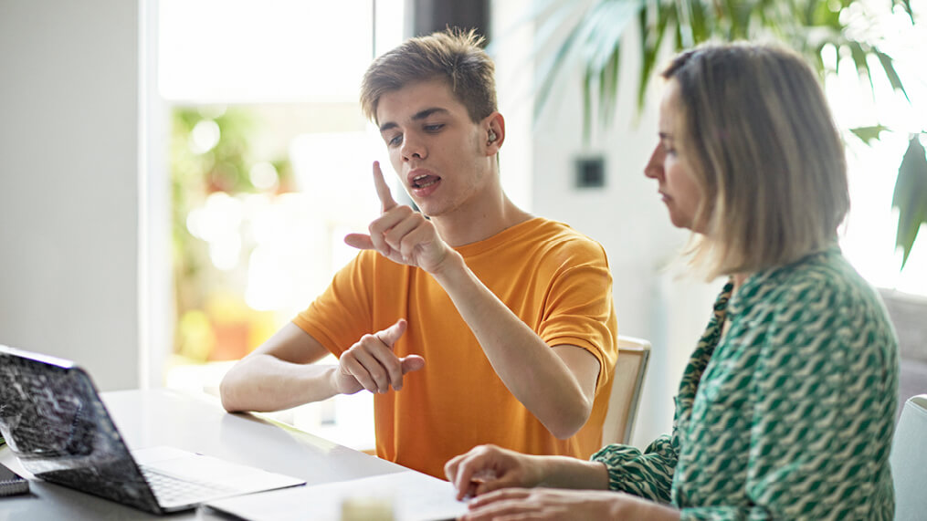person-and-family-member-discussing-support-needs.jpg